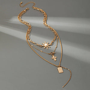 LAYER CELESTIAL CROSS SUN TOGGLE CHARM NECKLACE