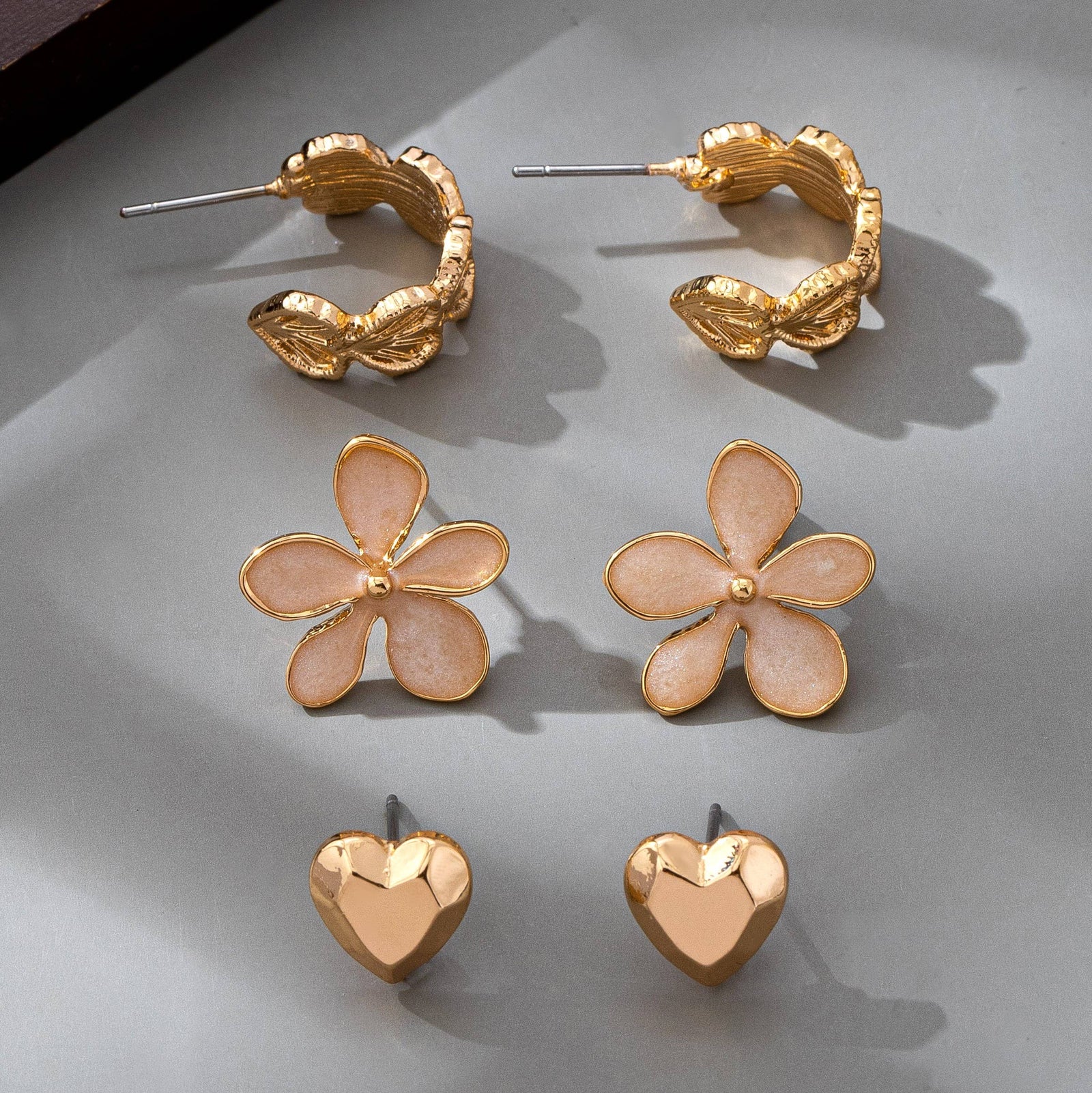 GOLD TRIO HEART FLOWER SEASHELL HUGGIE HOOP EARRINGS
