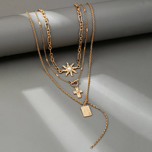 LAYER CELESTIAL CROSS SUN TOGGLE CHARM NECKLACE